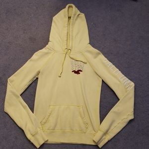Yellow Hollister pullover hoodie